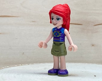 Mia wearing Olive Green Shorts, Dark Purple Shoes and Top with Diamonds and Triangles - Friends Genuine LEGO® Minifigure