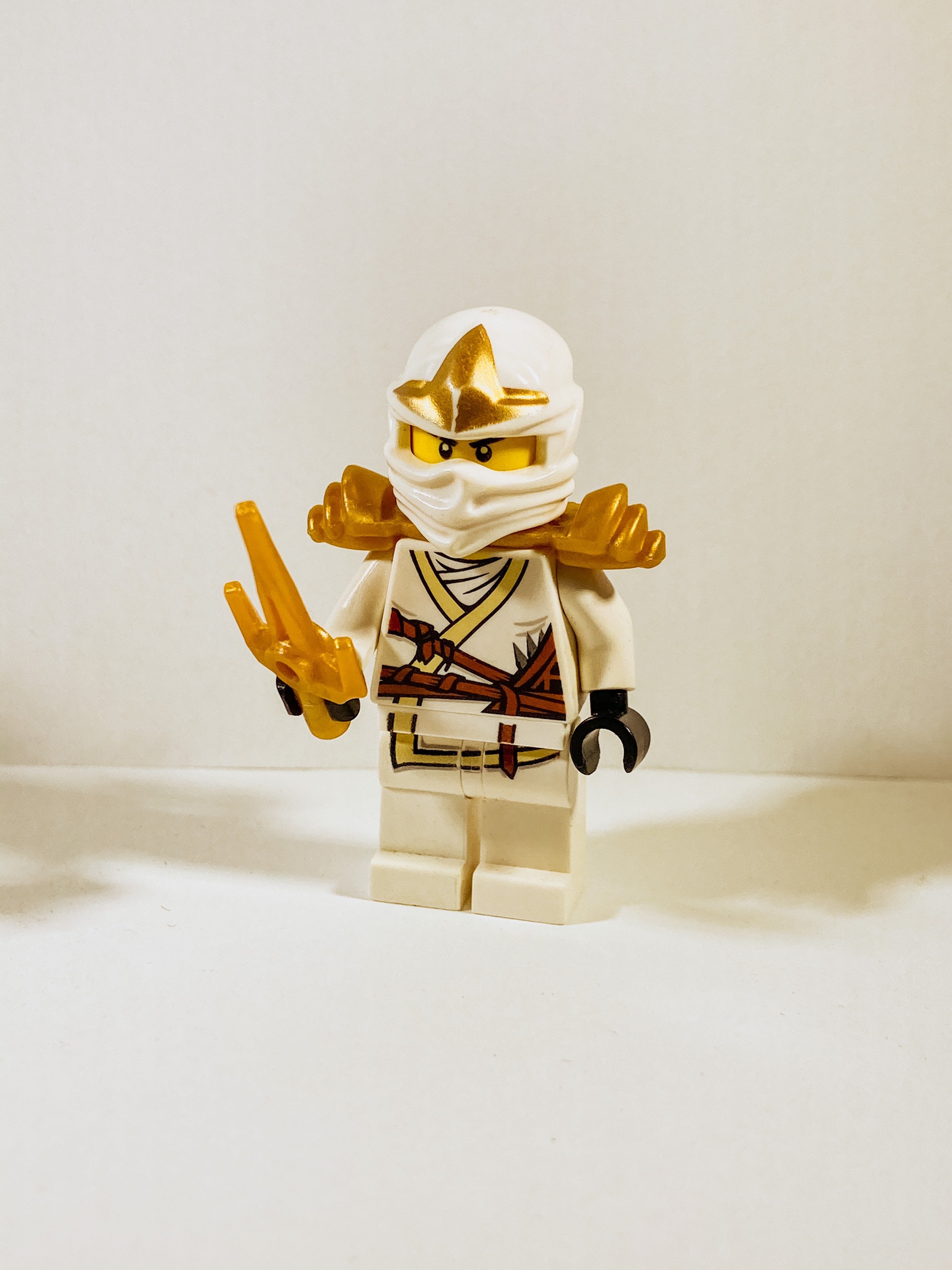 Zane ZX With Armor Holding a Golden Sai - Ninjago LEGO® Minifigure