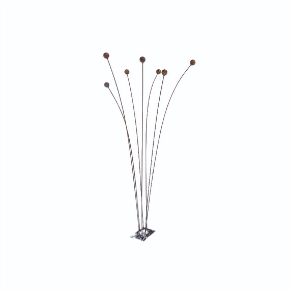 Rusty Metal Garden Art: Kinetic Sculpture with Swaying Balls