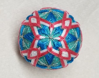 2.5 Inch Diameter Japanese Temari Ball (Embroidered Ornamental Ball), Coral and White with Bright Blue Interwoven Pattern on Teal Ball