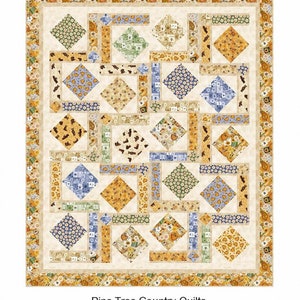 May include: A quilt pattern called "Honey Maze" by Pine Tree Country Quilts. The quilt features a geometric design with a variety of yellow, brown, blue, and green fabrics. The quilt is surrounded by a border of yellow and brown fabric.