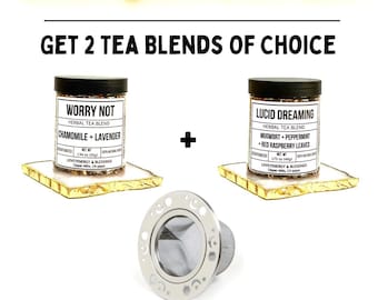 May include: An image promoting a customizable tea set. It features two jars of herbal tea blends, "Worry Not" and "Lucid Dreaming", alongside a celestial tea infuser. The text "Build Your Own Box" and "Get 2 Tea Blends of Choice" are also displayed.