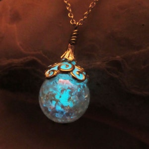 Magic ball pendant glow in the dark