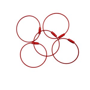 May include: Five red key rings with metal clasps are arranged against a white background. The key rings are circular and made of a flexible, coated wire. The clasps are small and cylindrical, connecting the ends of each ring.