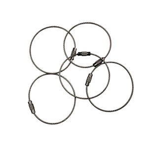 May include: A collection of silver-colored steel cable key rings with screw-on barrel connectors. The key rings are circular and made of tightly wound steel cable. The connectors are silver and black.