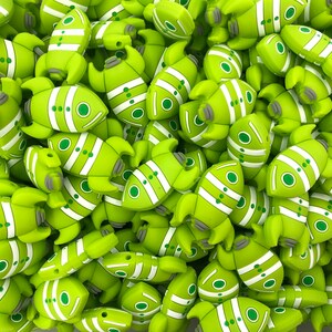 May include: A large pile of green silicone rocket-shaped beads. The rockets have white stripes and green circles.
