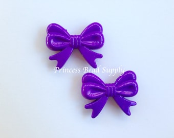One Dark Purple Acrylic Bow Beads