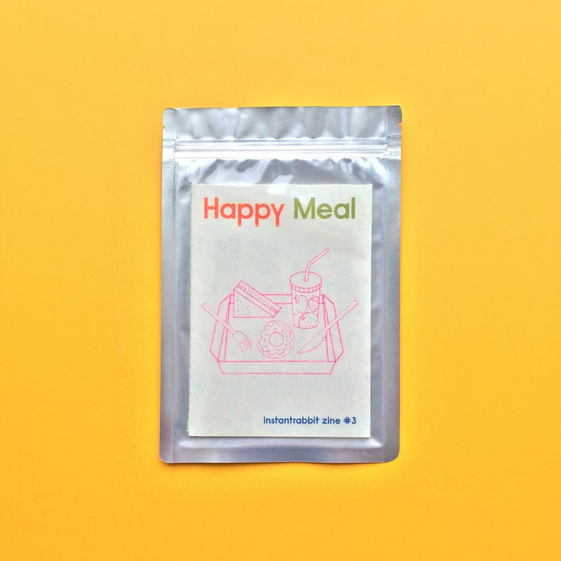 Happy Meal Zine with Pouch. Food themes zine by three illustrators. Riso printed zine.