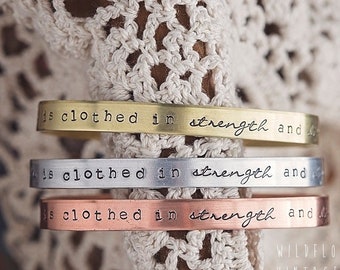 She is Clothed in Strength and Dignity Cuff Bracelet | Hand Stamped Christian Bible verse Proverbs 31:25 Religious Gifts for Her