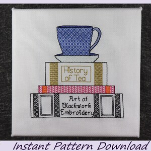 May include: A cross stitch pattern featuring a stack of books with a teacup and saucer on top. The top book has the title "History of Tea" and the bottom book has the title "Art of Blackwork Embroidery".