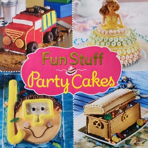 May include: A book titled "Fun Stuff Party Cakes" with four different cake designs on the cover. The cakes are a red truck, a princess cake, a scuba diver, and a treasure chest.