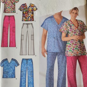 May include: Simplicity sewing pattern 4378 for scrub tops and pants. The pattern features a V-neck wrap top with a colorful graphic print, a V-neck top with short sleeves, and straight-leg pants with side cargo pockets and a drawstring waist.