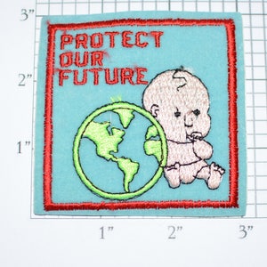 May include: A blue and red embroidered patch with the text "Protect Our Future" and a cartoon baby holding a green globe.