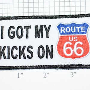 May include: White patch with black embroidered text "I GOT MY KICKS ON" and a red and blue Route 66 sign with white text.
