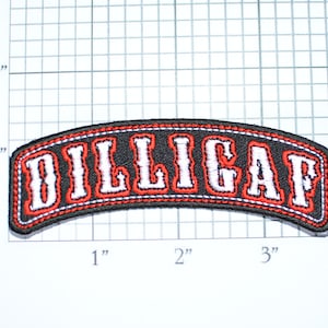 May include: Black and red embroidered patch with the word "DILLIGAF" in white lettering.