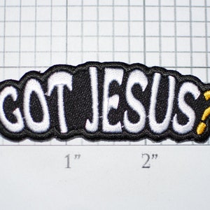 May include: Black and white embroidered patch with the text "GOT JESUS?" in white with a gold question mark. The patch is approximately 2 inches wide.