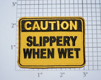 Caution Slippery When Wet Iron On Embroidered Clothing Patch Traffic Road Warning Sign Novelty Emblem Funny Cute Novelty Emblem Innuendo