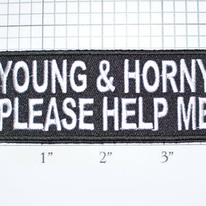 May include: Black rectangular patch with white embroidered text that reads "YOUNG & HORNY PLEASE HELP ME". The patch measures approximately 4 inches wide and 1 inch tall.