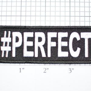 May include: Black and white embroidered patch with the text "#PERFECT" in white lettering on a black background.
