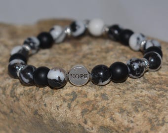 Pulsera Hope de jaspe cebra: ónix mate, joyería elástica inspiradora