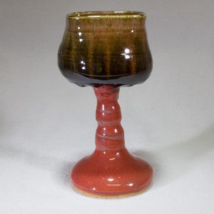 Red and black, square topped stoneware chalice.