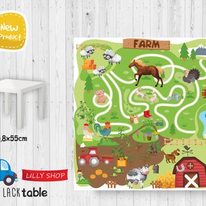 May include: A colorful farm-themed play mat with a maze, animals, and a red barn. The mat is 55.8 by 55 centimeters and is perfect for kids to play on. The mat is new and is available for purchase.