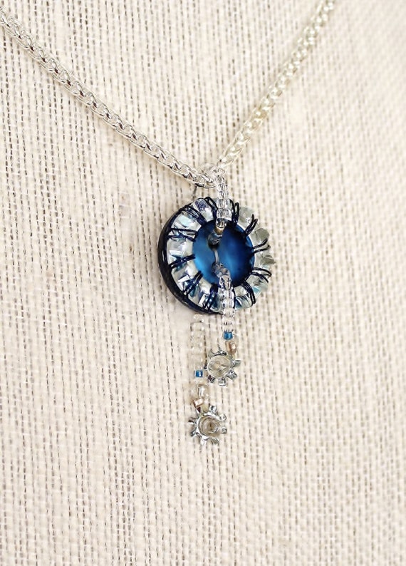 Blue sparkle wrapped wire pendant