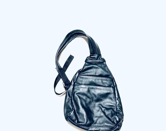 Small vintage minimalist, convertible backpack. Black supple leather backpack.