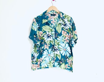 Blue green floral print shirt. Island paradise boxy, tie back top. 100% rayon.