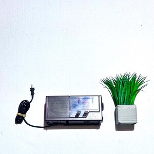 PANASONIC clock and radio. Retro wood grain working, Panasonic FM/AM Radio & digital clock. Made in Taiwan.