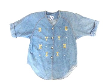 Light wash studded denim shirt. Roman numerals short sleeve denim shirt.