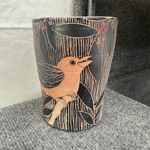 Handmade pottery bird 5.5  inch tall 4 inch wide Pottery Vase.  Hand drawn  bird vase with red berries.