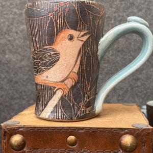 Handmade pottery bird coffee cup, 10-12  ounce soda fired mug.
