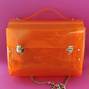 Sac messager orange emblématique cartable végétalien transparent pour étudiants, tendance streetwear glamour pour transporter toutes vos affaires