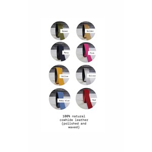 May include: Eight circular swatches of cowhide leather in green, golden, navy, pink, yellow, silver, baby blue, and red. Text below reads: 100% natural cowhide leather (polished and waxed). Each swatch displays the color name next to it.