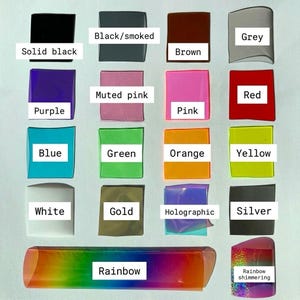 Puede incluir: Una cuadr&iacute;cula de objetos rectangulares coloridos, cada uno etiquetado con un nombre de color. Los colores incluyen negro, ahumado, marr&oacute;n, gris, morado, rosa apagado, rosa, rojo, azul, verde, naranja, amarillo, blanco, dorado, hologr&aacute;fico, plateado, arco&iacute;ris y arco&iacute;ris brillante.
