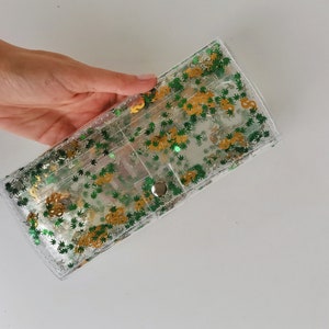 Carteira longa transparente, carteira grande com estilo engraçado, folhas de maconha verdes, coelhinhos sujos prateados, confete de dólares dourados, acessórios brilhantes, garota rave