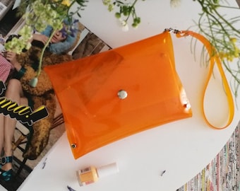 Orange wristlet  bag, clear stadium bag, orange minimalist clutch, gift for vegan, gift for  fans, clear neon bag,transparent plastic bag