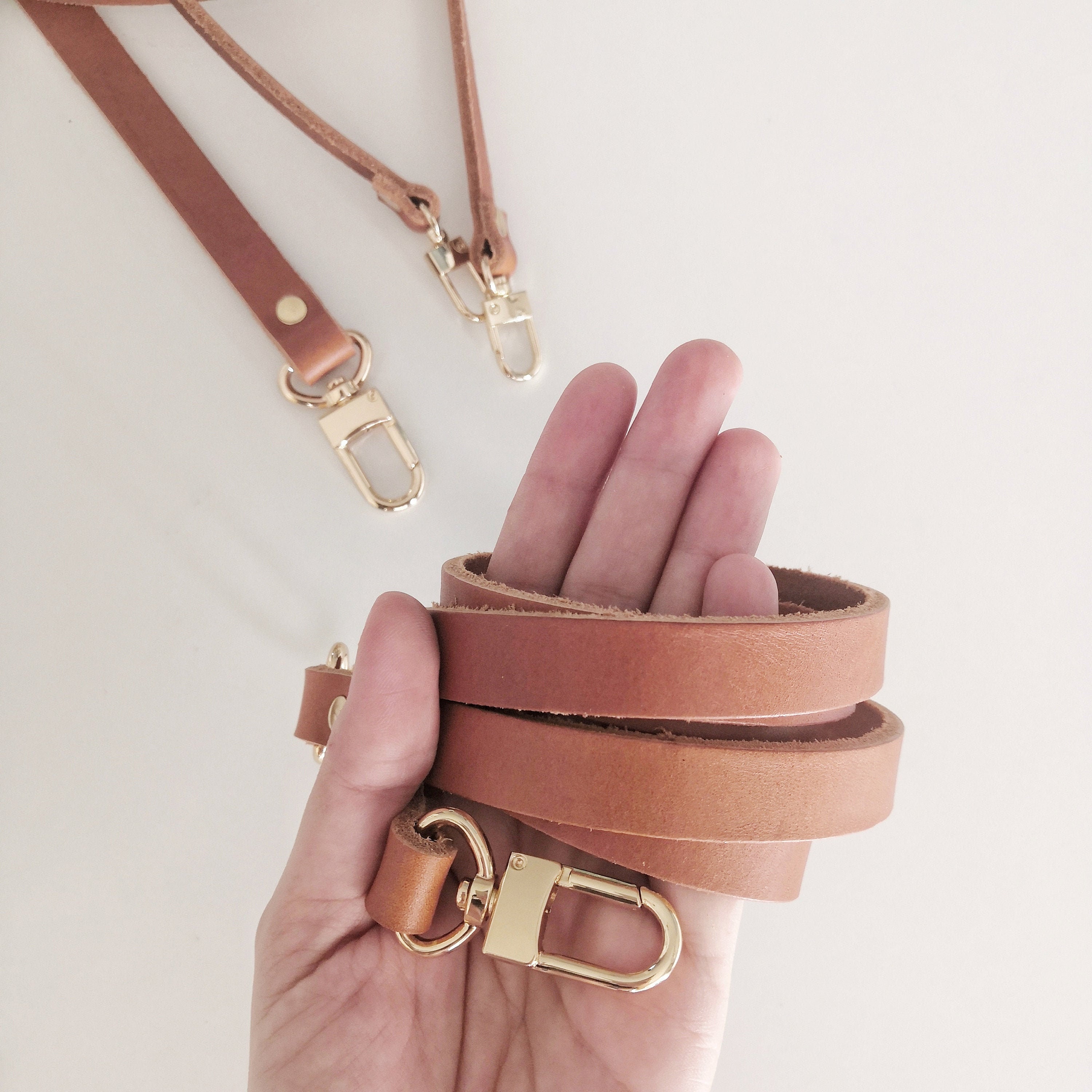 Reveal: neo noe with bandouliere strap