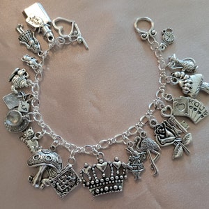 ALICE IN WONDERLAND charm bracelet w/charms PLUS matching key ring NWT!