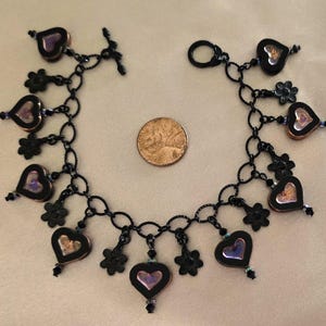 Black heart charm bracelet, Black iridescent glass heart beads, Matte black flower charms, Woman&#39;s charm bracelet