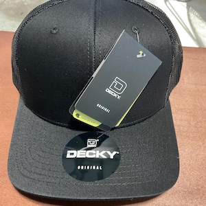 May include: Black mesh back baseball cap with a black brim and a black and yellow "DECKY. ORIGINAL" logo.