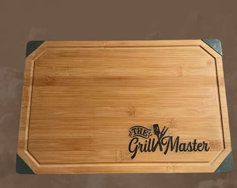 Grill Master Cutting board laser engraved