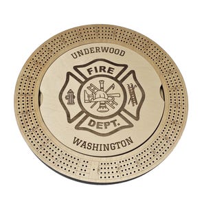 May include: A wooden cribbage board with a custom design featuring a fire department logo. The logo includes the words "Fire Dept." and "Underwood Washington".