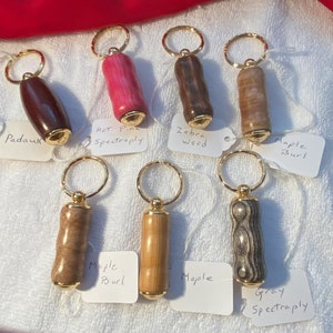 Pill box, key ring, wooden or acrylic, under 20 dollars, sized for pocket or purse, keep pills safe, handy and ready, an appreciated gift