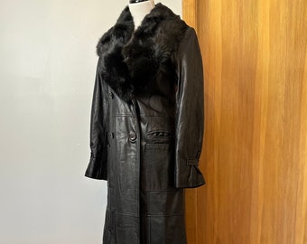 70’s black leather coat~ full length long fitted overcoat~ large black fur collar~ nipped waist 70’s Glam- Rock size Smallish