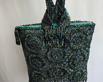 Beautiful vintage beaded bag emerald green with multicolored iridescent micro beads~ beautiful fringed knotted beadwork jewel tones 1960’s