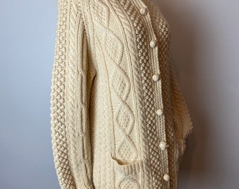 Ameri（アメリ）の「2WAY DISTORTION CABLE CARDIGAN
