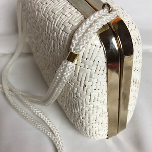 70s White woven wicker basket purse shiny gold accent clasp lacquered long roped straps clam style minimalist mod retro 1960s 1970s image 2