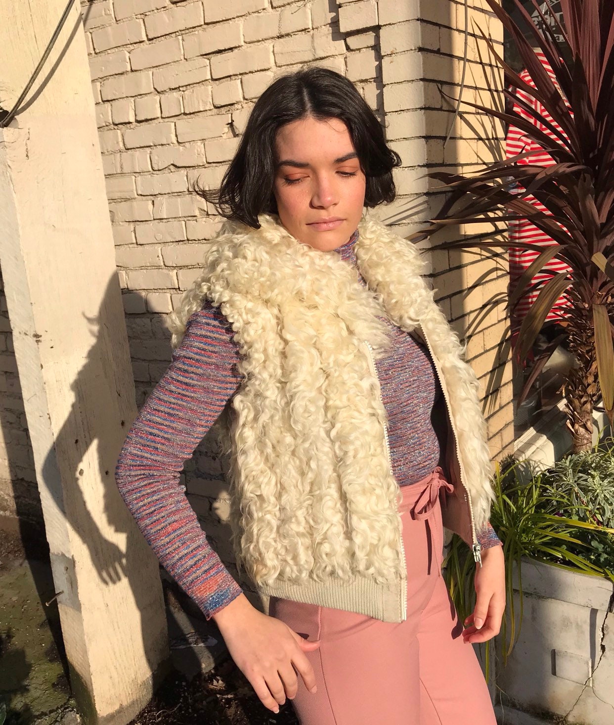 white fuzzy coat
